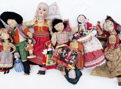 A variety of antique and vintage dolls