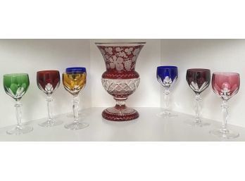 (7) CUT to CLEAR CORDIALS and VASE