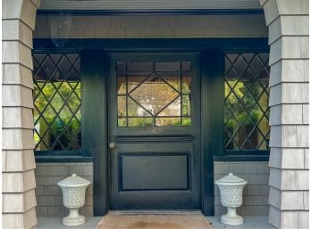 PAIR LATTICE WORK COVERED CEMENT URNS