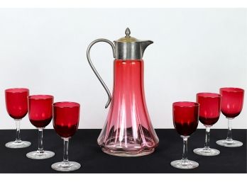 VICTORIAN CRANBERRY GLASS CLARET JUG & (6) WINES