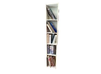 NARROW WHITE BOOK SHELF WITH CONTENTS