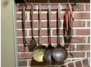 GROUPING OF ANTIQUE IRON COOKWARE, LIGHTING, ETC