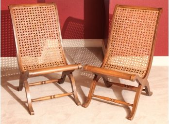 PAIR OF CANE WORK LOLLING CHAIRS