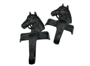 Two (2) Cast Iron Horse Head Hooks