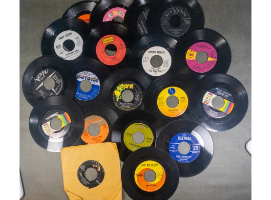 Collection Of Vintage 45 RPM Vinyl Records Featuring Elvis Presley, The Beatles, More