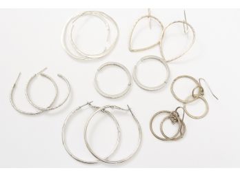 Collection Of Silver And Gold Colored Hoop Earrings